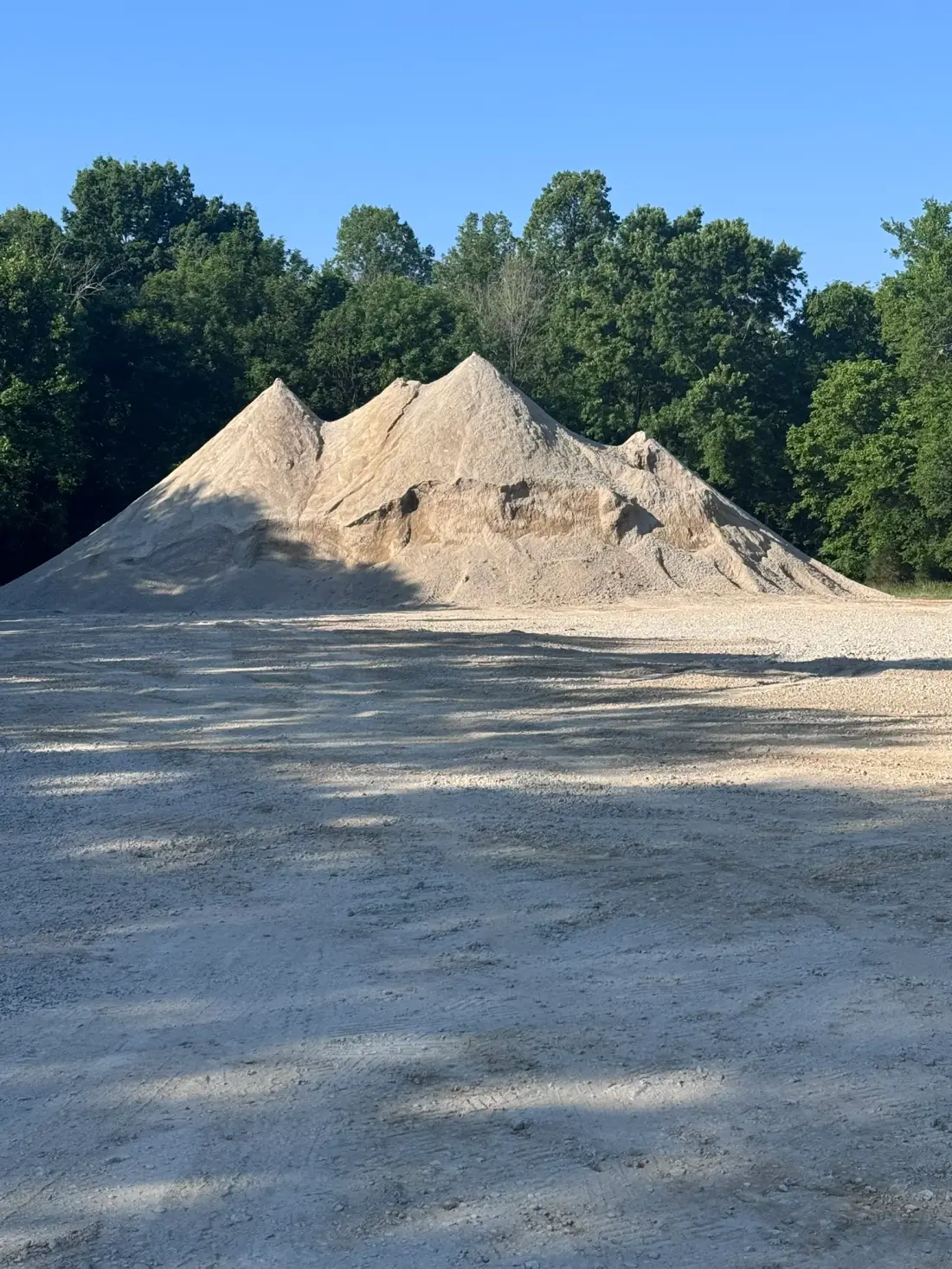 Finished 1.5-inch minus crushed recycled concrete stockpile at the J. Coble yard